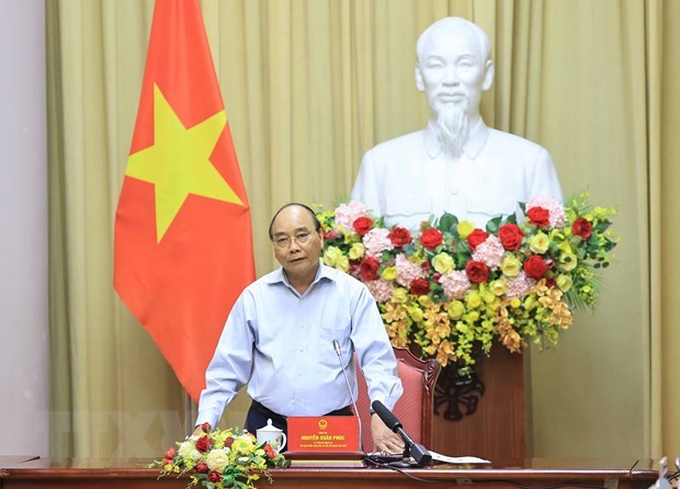 President hails garment sector for growth amid COVID-19 pandemic hinh anh 1