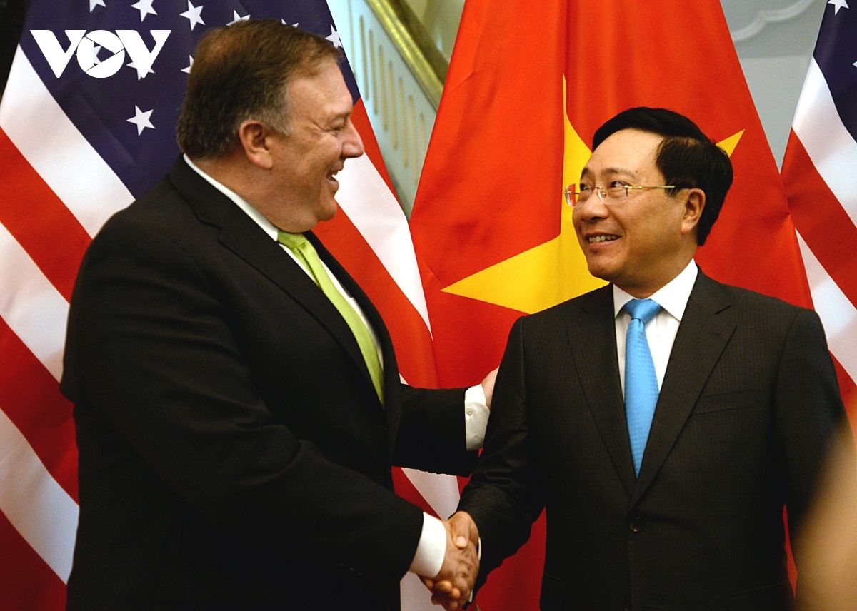 Secretary Mike Pompeo shaking hands with Deputy Prime Minister and Foreign Minister Pham Binh Minh during his Vietnam visit in July 2018.